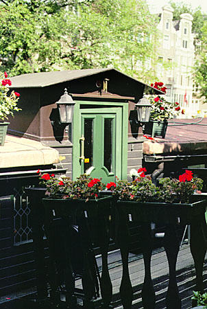 Houseboat on Prinsengracht Canal. Amsterdam, Netherlands.