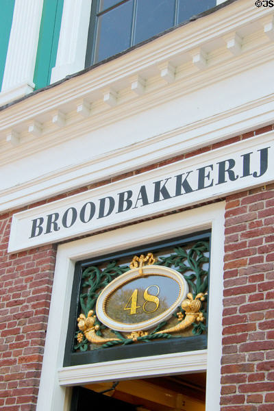 Bread bakery with sign & ornate carving over the entrance at Arnhem Openlucht Museum. Arnhem, Netherlands.