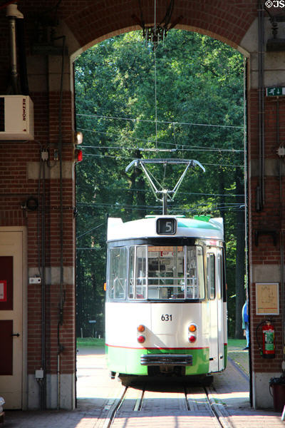 Tram 631 with pantograph poised to enter barn at Arnhem Openlucht Museum. Arnhem, Netherlands.