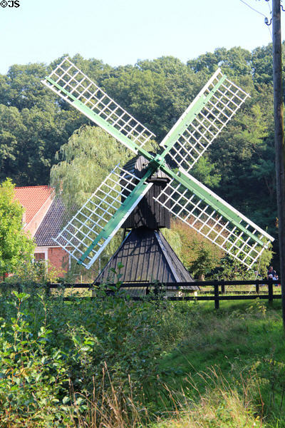 Windmill in pastoral setting at Arnhem Openlucht Museum. Arnhem, Netherlands.