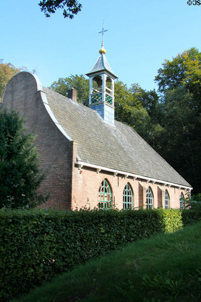 Characteristically Dutch roof line & simple bell tower on Chapel from 's-Heerenoek at Openlucht Museum. Arnhem, Netherlands.