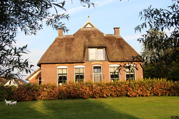 Large home with ornate thatched roof. Giethoorn, Netherlands.