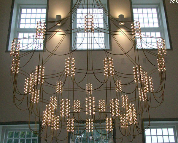 Elegant ceiling lighting fixture in modernized section. Het Loo, Netherlands.