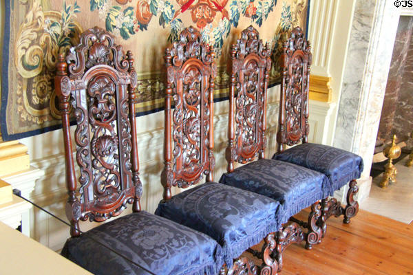 New Dining Room side chairs with ornately carved backs & blue damask seats. Het Loo, Netherlands.