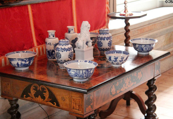 Delftware objects on marquetry table in Princess Mary's Antechamber. Het Loo, Netherlands.