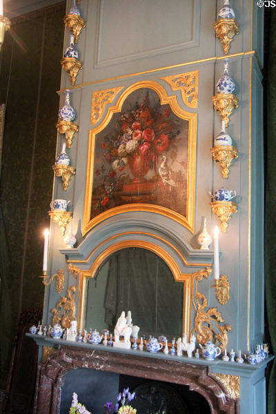 One of Princess Mary's private rooms with miniature Delft & other objects arrayed on mantel. Het Loo, Netherlands.