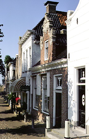 Houses on small canal. Sloten, Netherlands.