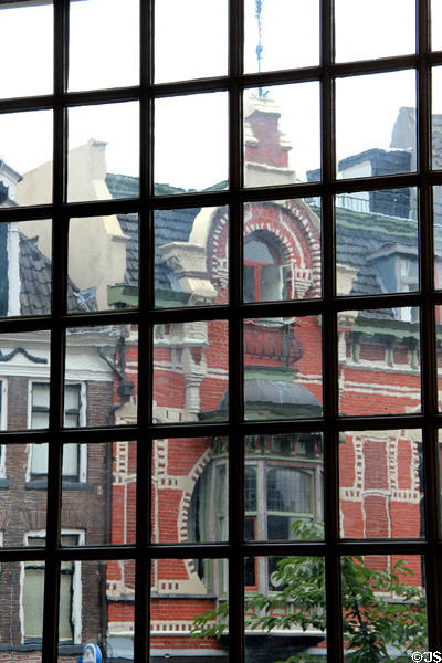 Historic building viewed through panees of glass window. Zwolle, Netherlands.
