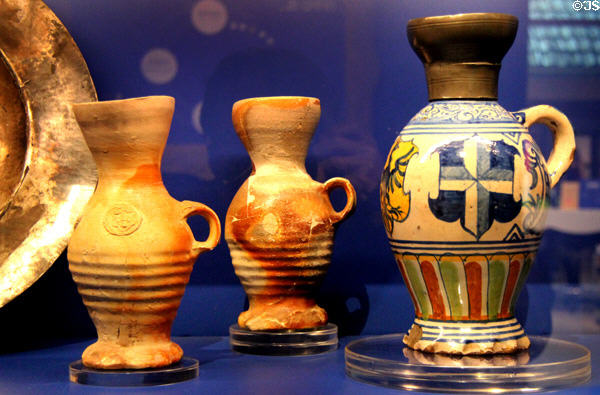 Majolica jug & funnel beakers (15th--16thC) with design on jug depicting coats of arms of Kampen, Deventer & Zwolle at ANNO Stadsmuseum Zwolle. Zwolle, Netherlands.