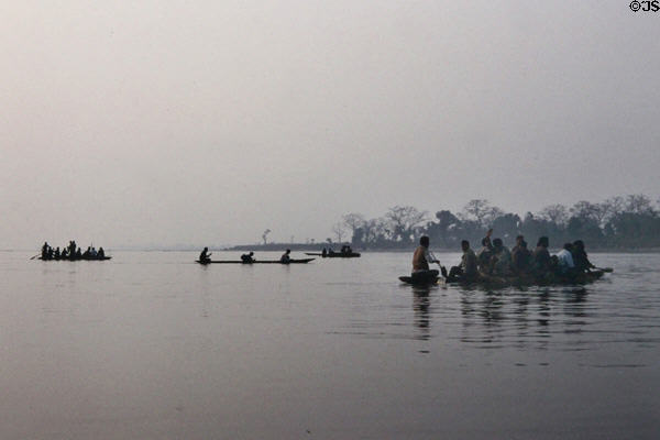 Villagers gathering reeds in Chitwan National Park. Nepal.