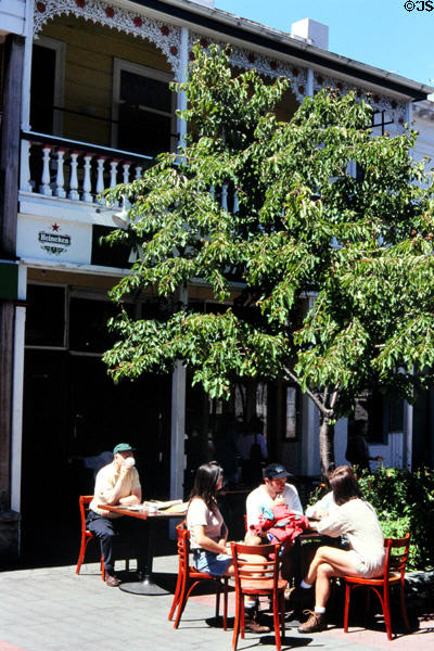 People at cafe-bar in Queenstown. New Zealand.
