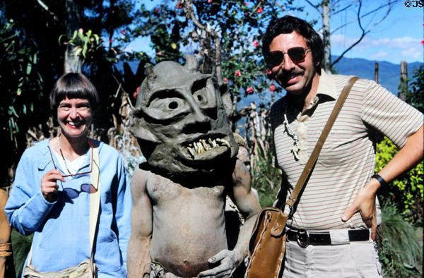 Visitors with mudmen. Papua New Guinea.