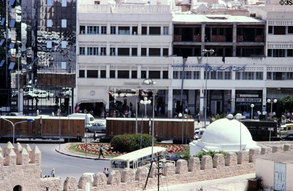 Freight train running down urban street Blvd. Hassen Ayachi. Sousse, Tunisia.