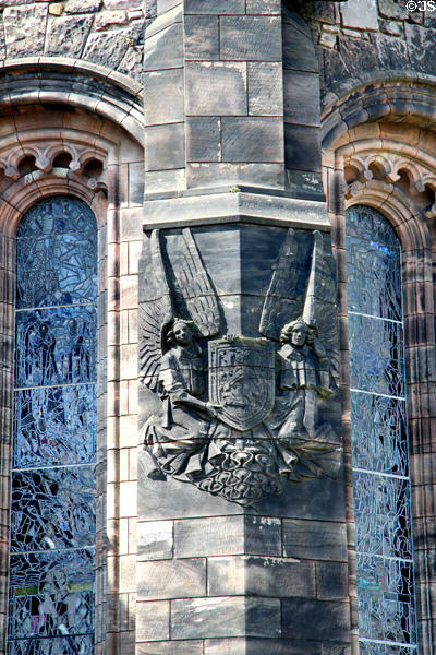 Carved angels holding Scottish lion at Scottish National War Memorial. Edinburgh, Scotland.