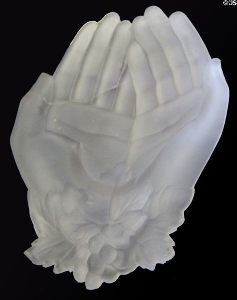 Press molded glass dish in shape of two hands (c1875) by Holyrood Glass Works after license from New England Glass Co. of Mass. USA at Museum of Edinburgh. Edinburgh, Scotland.