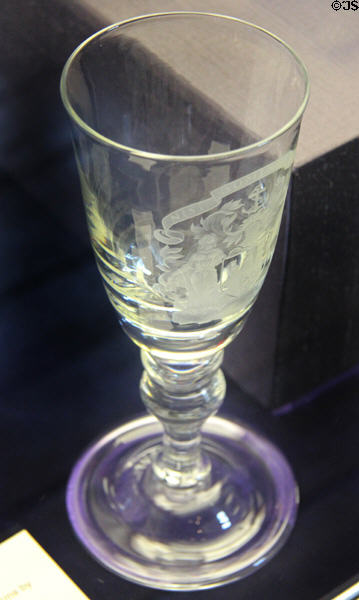 Glass goblet engraved with Edinburgh arms (c1963) by Alison Geissler for Edinburgh Crystal at Museum of Edinburgh. Edinburgh, Scotland.