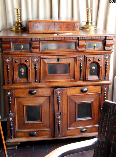 Inlaid cabinet (17thC) supporting bible box in painted chamber at Gladstone's Land tenement house. Edinburgh, Scotland.
