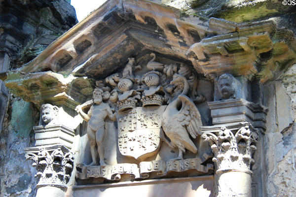 Doorway pediment with coat of arms at Holyrood Abbey. Edinburgh, Scotland.