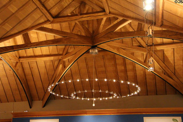 Ceiling beams & chandelier at Queens Gallery. Edinburgh, Scotland.