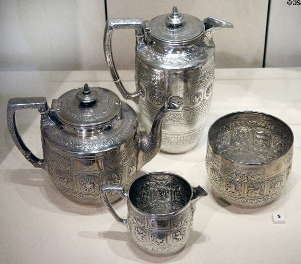 Silver tea set with signs of zodiac (1872-4) by J. Reid of Glasgow plus hot water jug added (1897-8) by W.W. Logan at National Museum of Scotland. Edinburgh, Scotland.