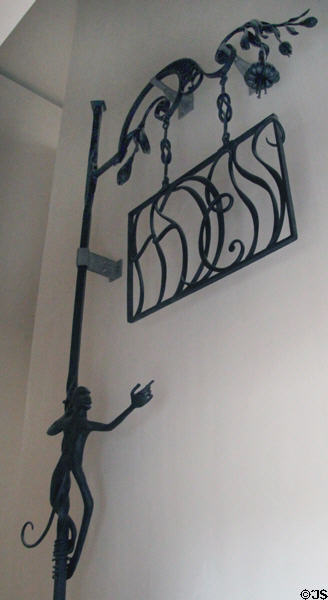 Scottish wrought iron sign with monkey at National Museum of Scotland. Edinburgh, Scotland.