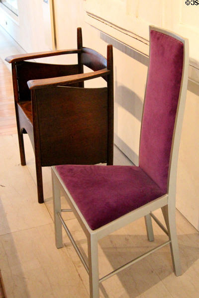 Oak armchair for Argyle Street Tea Rooms (1898) & silver-painted side chair for Willow Tea Rooms (1903) both by Charles Rennie Mackintosh & made by Francis Smith of Glasgow at National Museum of Scotland. Edinburgh, Scotland.