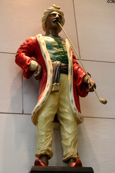 Tobacco shop sign of Moor smoking pipe carving (1835) by J. Steele at National Museum of Scotland. Edinburgh, Scotland.