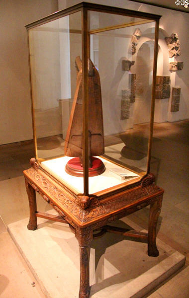 Clarsach (Queen Mary harp) (c1500) in a Scottish Celtic Art Nouveau case (1904) by Whytock & Reid of Edinburgh at National Museum of Scotland. Edinburgh, Scotland.