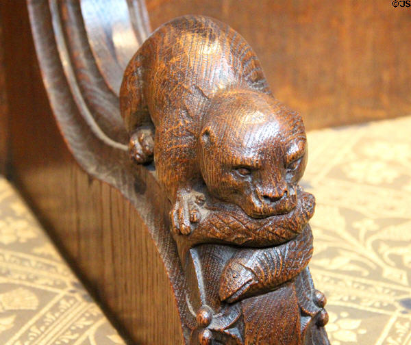Carved otter eating fish in Thistle Chapel at St Giles Cathedral. Edinburgh, Scotland.