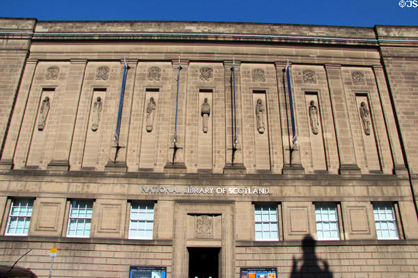Row of sculpted figures by Hew Lorimer at National Library of Scotland. Edinburgh, Scotland.