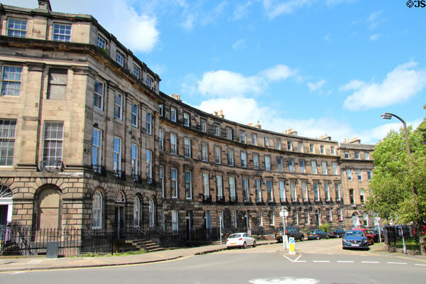 Curved frontage of 47-row houses forming classical palace block (1822) on Ainslie Place. Edinburgh, Scotland. Architect: James Gillespie Graham.