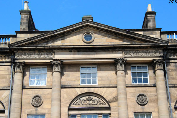 Central pediment of Georgian row houses on Charlotte Square by Robert Adam. Edinburgh, Scotland.