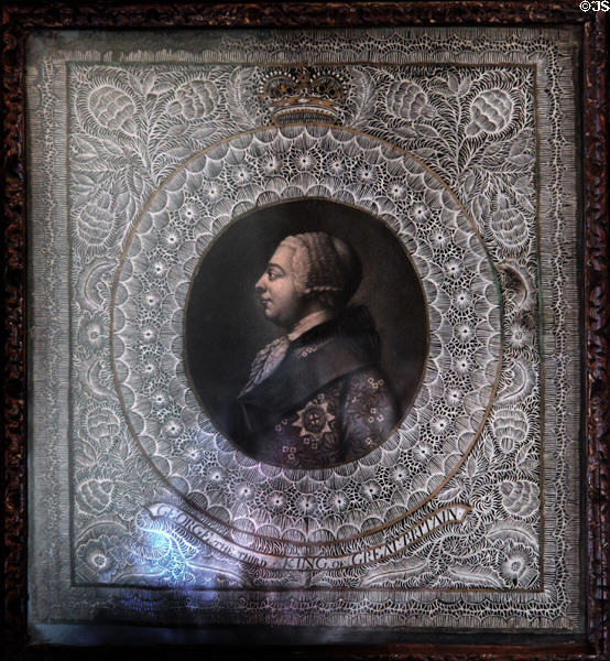 Stipple engraving (1760) of George III by unknown with cut paper border by Thomas Hunter of Edinburgh at Georgian House museum. Edinburgh, Scotland.