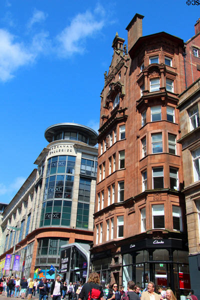 Brittania Building red sandstone commercial building with octagonal corner (1898) with Buchanan Galleries beyond on Buchanan St. Mall. Glasgow, Scotland. Architect: John A. Campbell.
