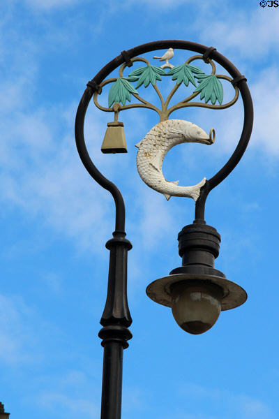 Lightstand with fish & bell at Glasgow Cathedral. Glasgow, Scotland.