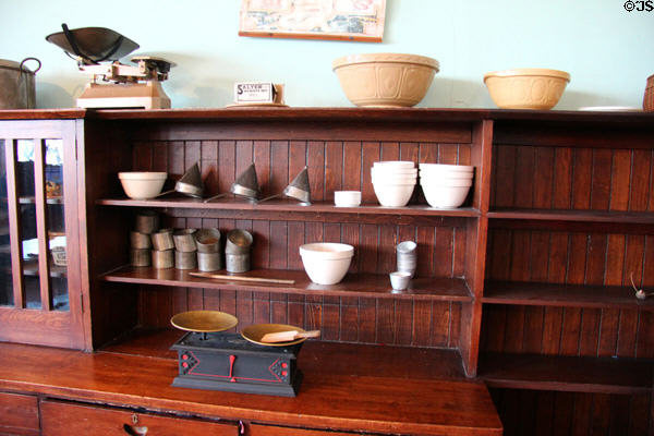 Scales & implements in cookery kitchen at Scotland Street School Museum. Glasgow, Scotland.