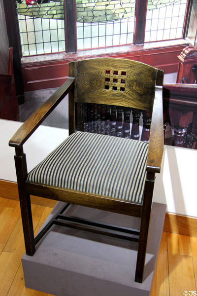 Glasgow School of Art Director's Room replica armchair (1904) by Charles Rennie Mackintosh at The Lighthouse. Glasgow, Scotland.