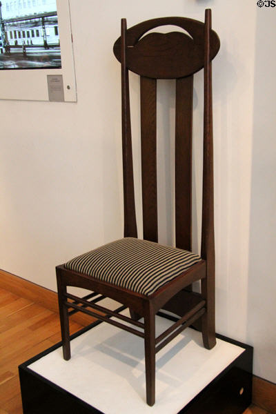 Glasgow School of Art high-back chair (1897-1900) by Charles Rennie Mackintosh at The Lighthouse. Glasgow, Scotland.