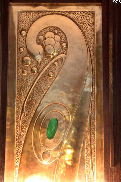 Copper peacock Art-Nouveau lamp reflector at Hill House. Helensburgh, Scotland.
