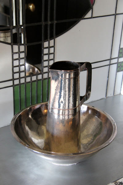 Silver-plated pitcher & basin by C.R. Mackintosh designed for another house of Catherine Cranston in main bedroom at Hill House. Helensburgh, Scotland.