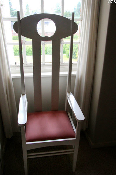Argyl Street Tearoom armchair (c1898) with tall back by C.R. Mackintosh at Hill House. Helensburgh, Scotland.