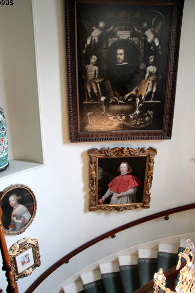 Spiral staircase with original Spanish paintings at Pollok House. Glasgow, Scotland.