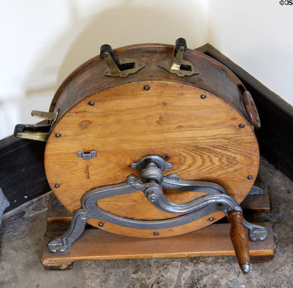 Knife cleaning machine at Holmwood. Glasgow, Scotland.