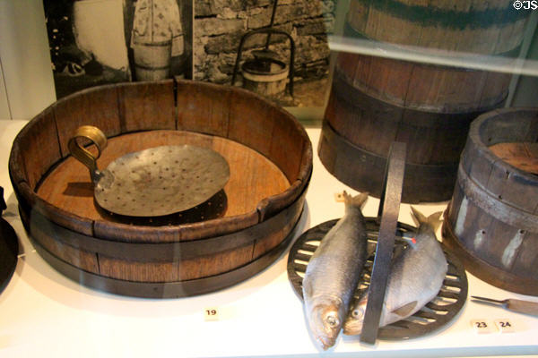Milk settling dish (boyne) & skimmer with brander fish roasting rack at National Museum of Rural Life. Kittochside, Scotland.