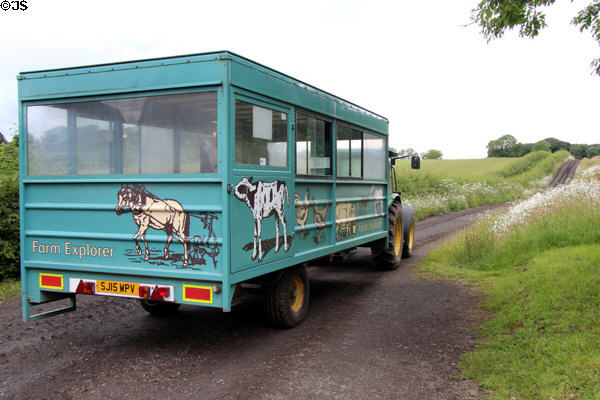Tractor pulled wagon takes visitors to John Reid farm at National Museum of Rural Life. Kittochside, Scotland.