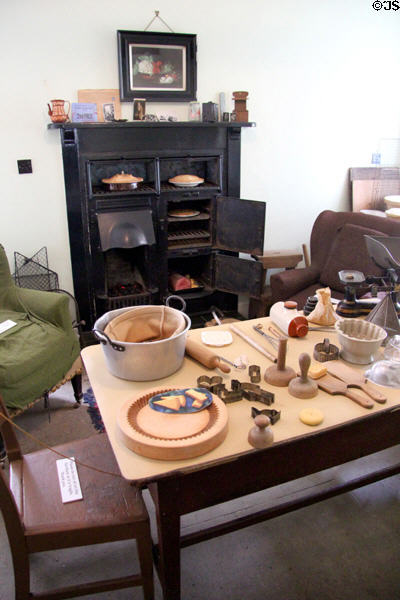 Kitchen with oven & work table in Reid farmhouse at National Museum of Rural Life. Kittochside, Scotland.