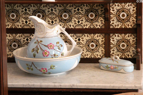 Tiled washstand with pitcher & basin in Reid farmhouse at National Museum of Rural Life. Kittochside, Scotland.