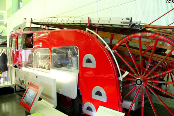Leyland Firemaster (1960-75) with ladder on wheels to roll along narrow streets to reach building at Riverside Museum. Glasgow, Scotland.