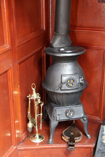Pot-bellied stove in poop cabin of Glenlee Tall Ship. Glasgow, Scotland.