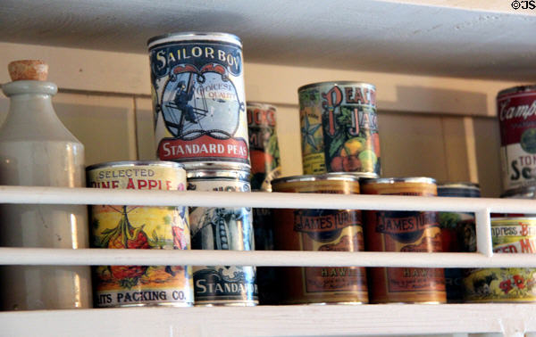 Antique canned goods in poop cabin pantry of Glenlee Tall Ship. Glasgow, Scotland.